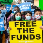 "Free the Funds" rally in front of school