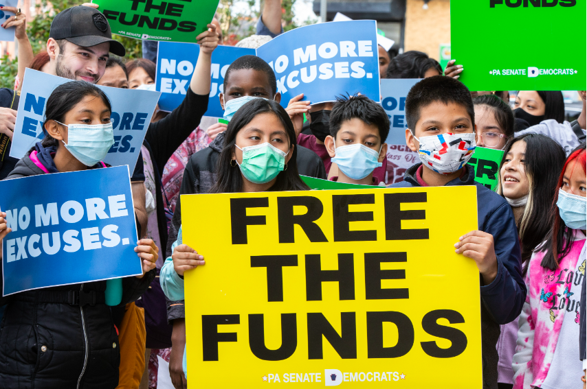 "Free the Funds" rally in front of school