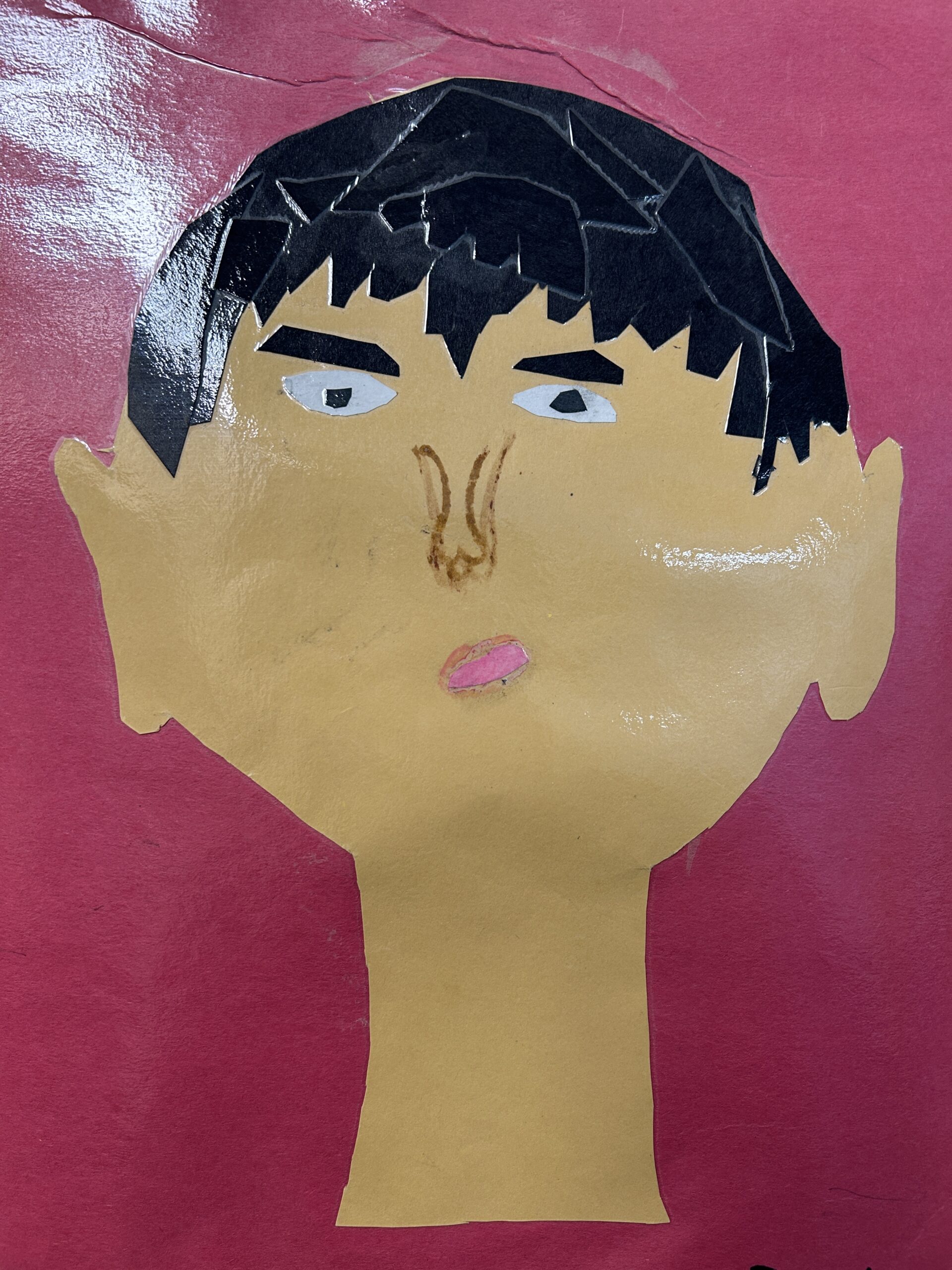 face collages outside of room 16 2025-2026