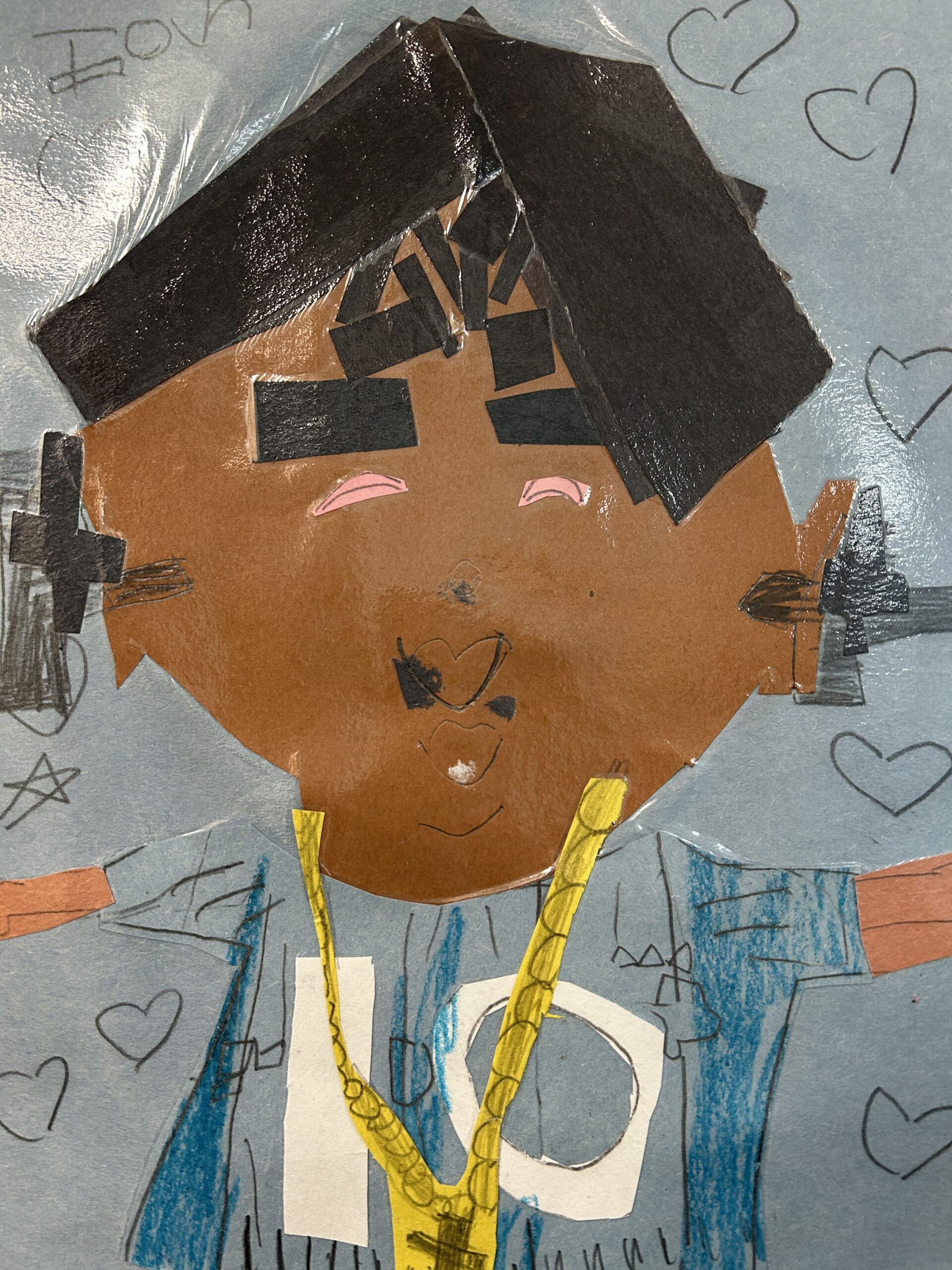 face collages outside of room 16 2025-2026